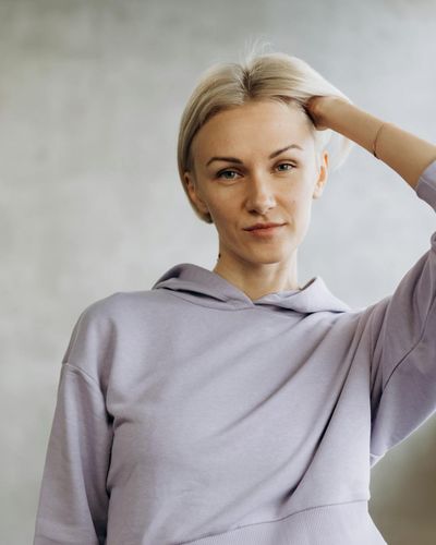 Portrait of Olga Zarichna, a calm and friendly yoga instructor.